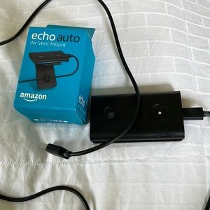Gently used Amazon Echo AUTO and new mount